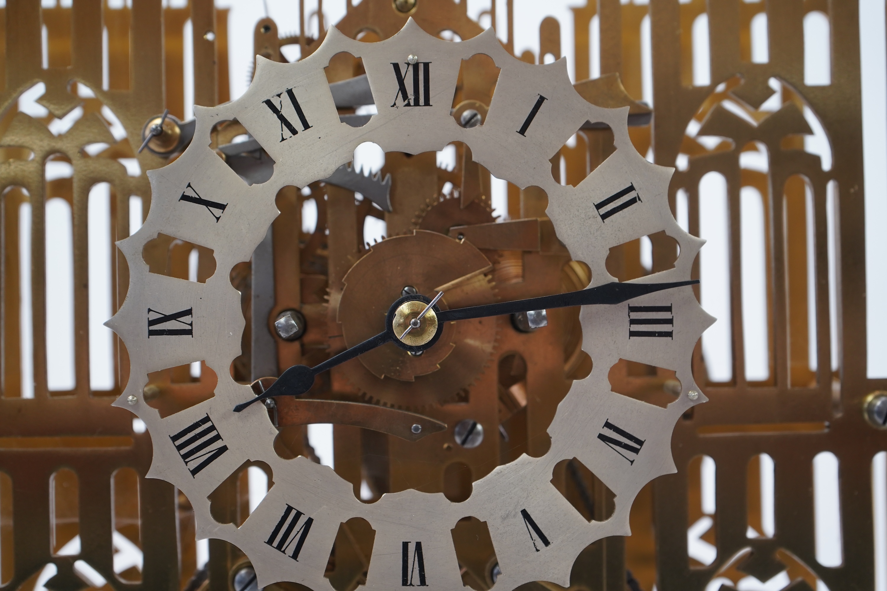 A mid 20th century brass skeleton ‘Cathedral’ clock